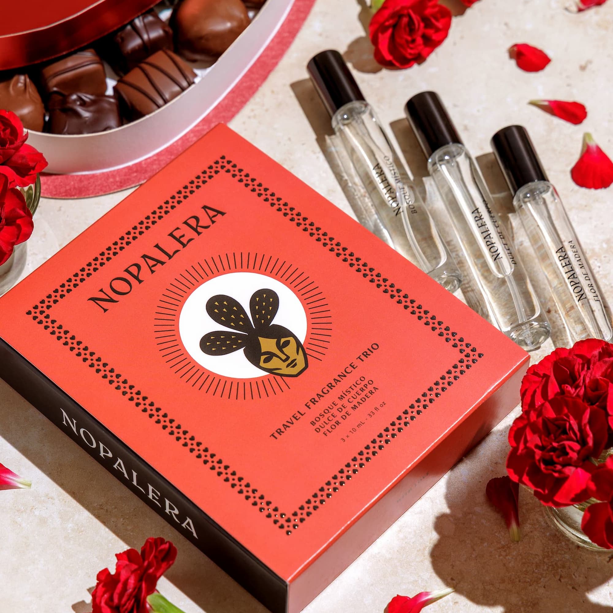 Nopalera Amor Valentine's Day fragrance trio in a romantic lifestyle setting