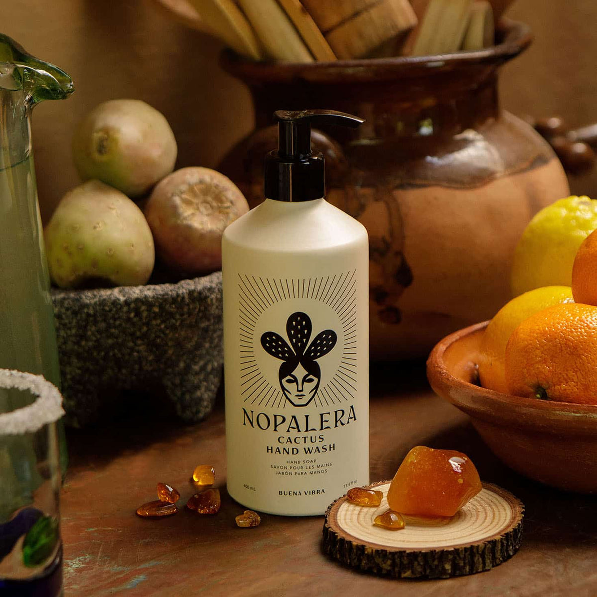 Nopalera Buena Vibra Cactus Hand Wash displayed with cactus and citrus fruits.