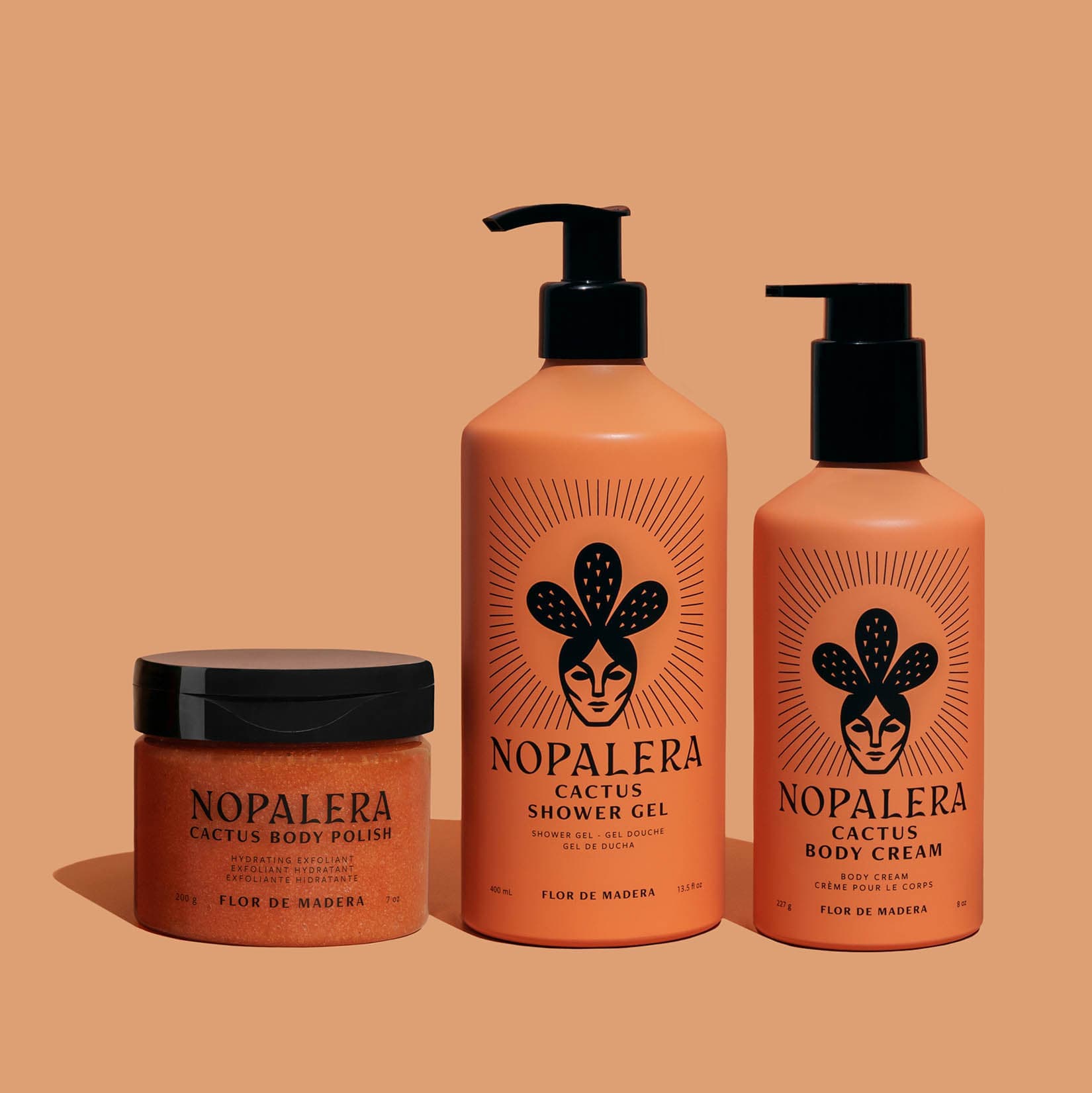 Three Nopalera body care products on a peach background.