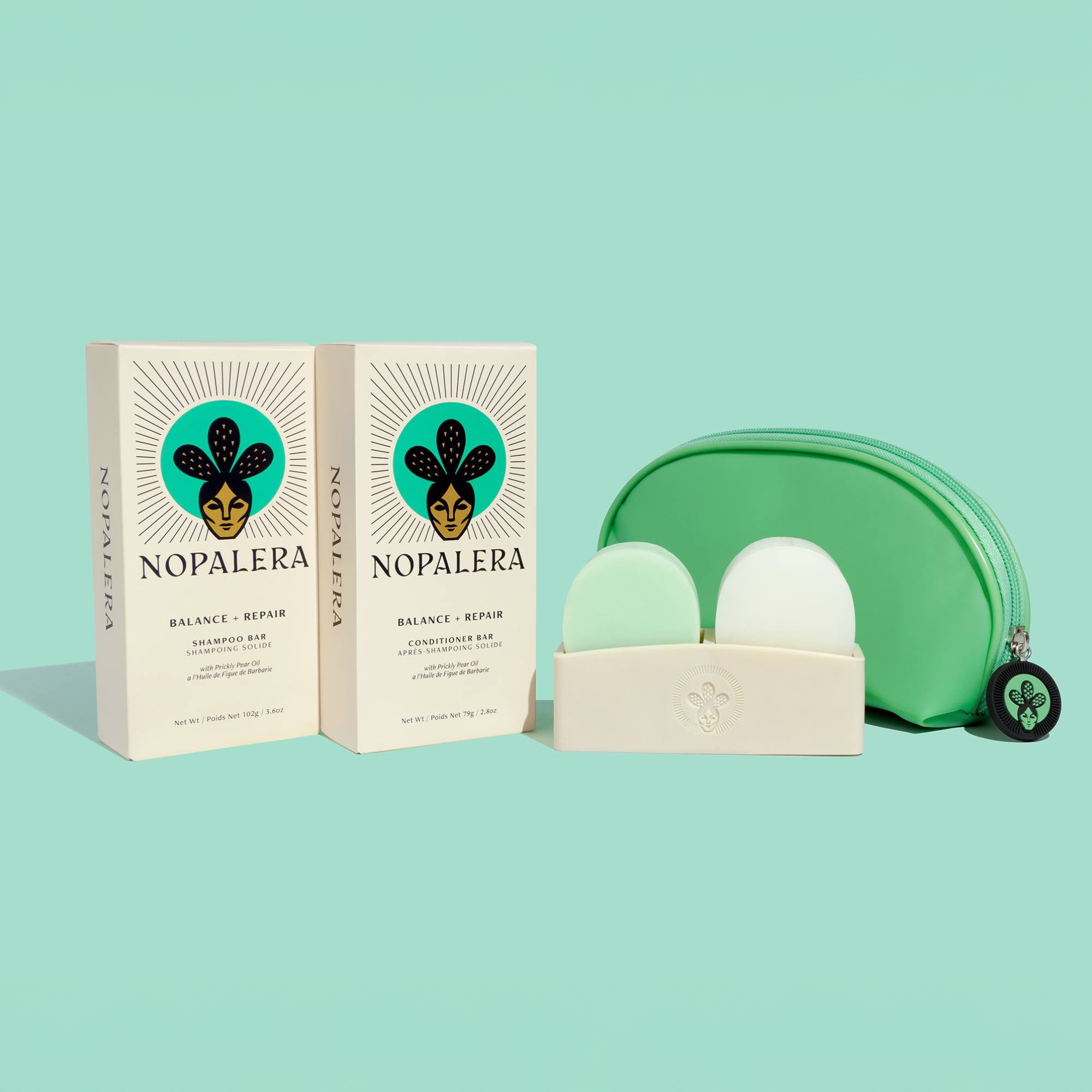Nopalera skincare products including shampoo barr, a conditioner bar, a pouch, and one green container on a light blue background.