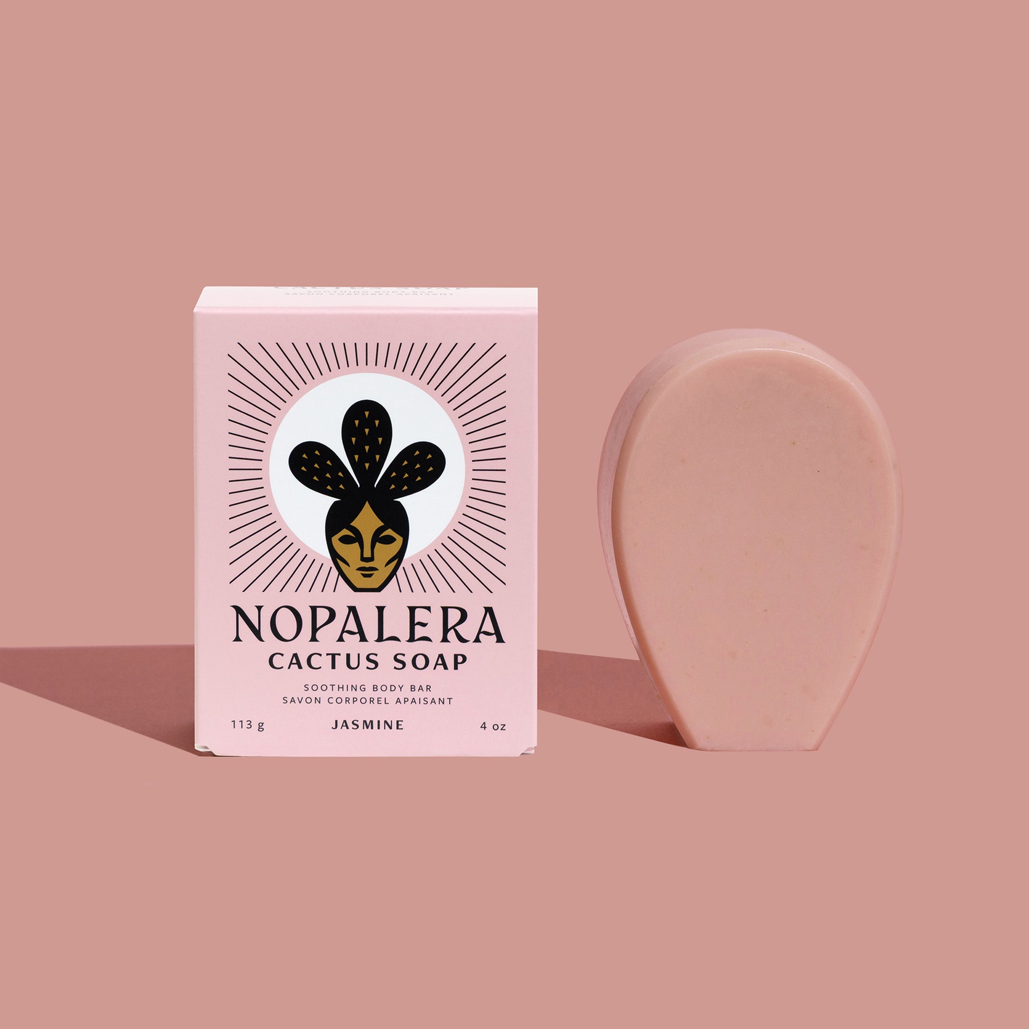 Nopalera cactus soap bar with packaging on a pink background