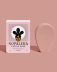 Nopalera cactus soap bar with packaging on a pink background