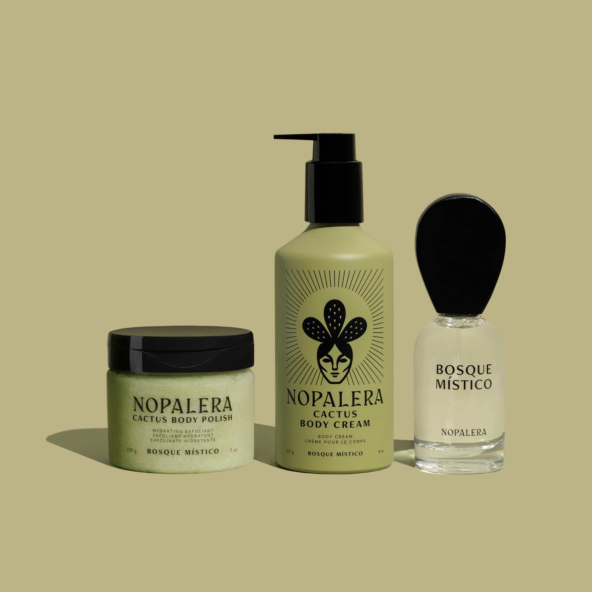 Three Nopalera Bosque Místico skincare products on a green background