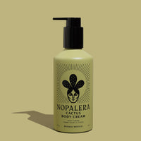 A green pump bottle of Nopalera Bosque Místico Body Cream with a graphic of a cactus and the text 'Bosque Místico' on the label.