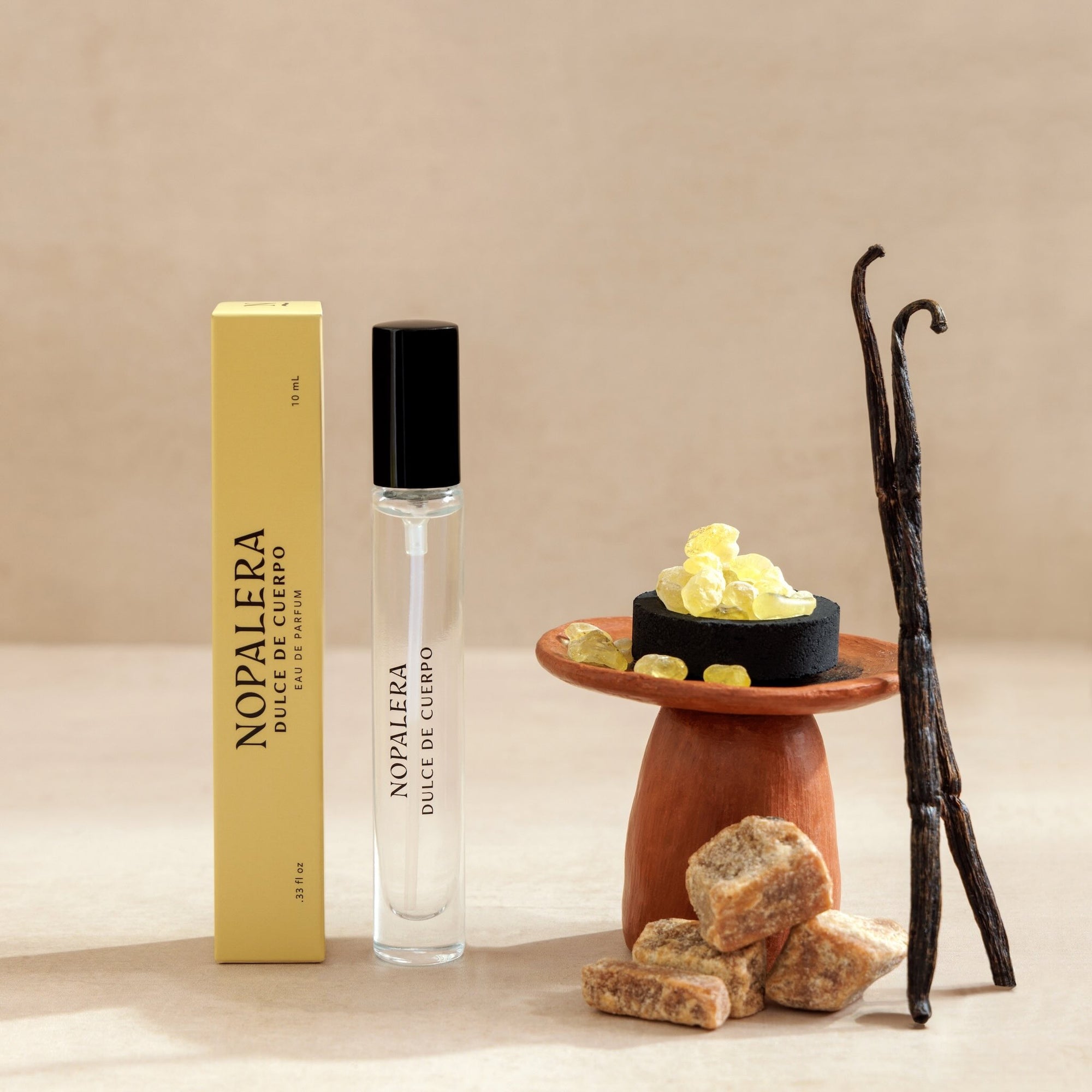 Nopalera Luxury Mexican fragrance Dulce de Cuerpo travel perfume roller with vanilla beans, resin, and sweet fragrance notes.