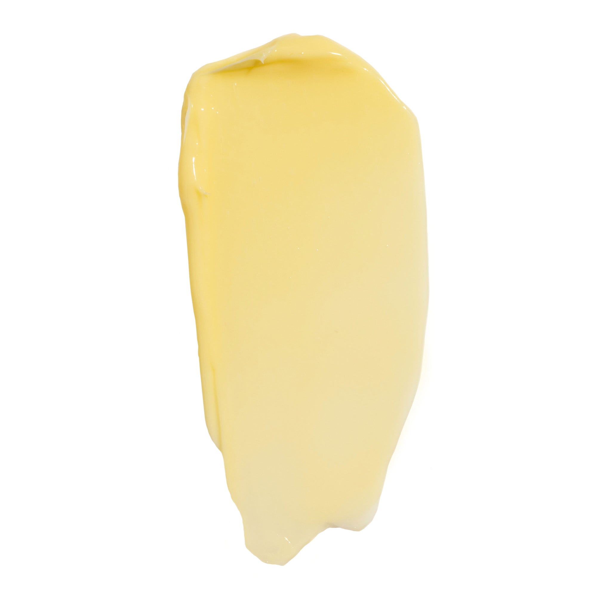 Swatch of light yellow Nopalera cream or frosting on a white background