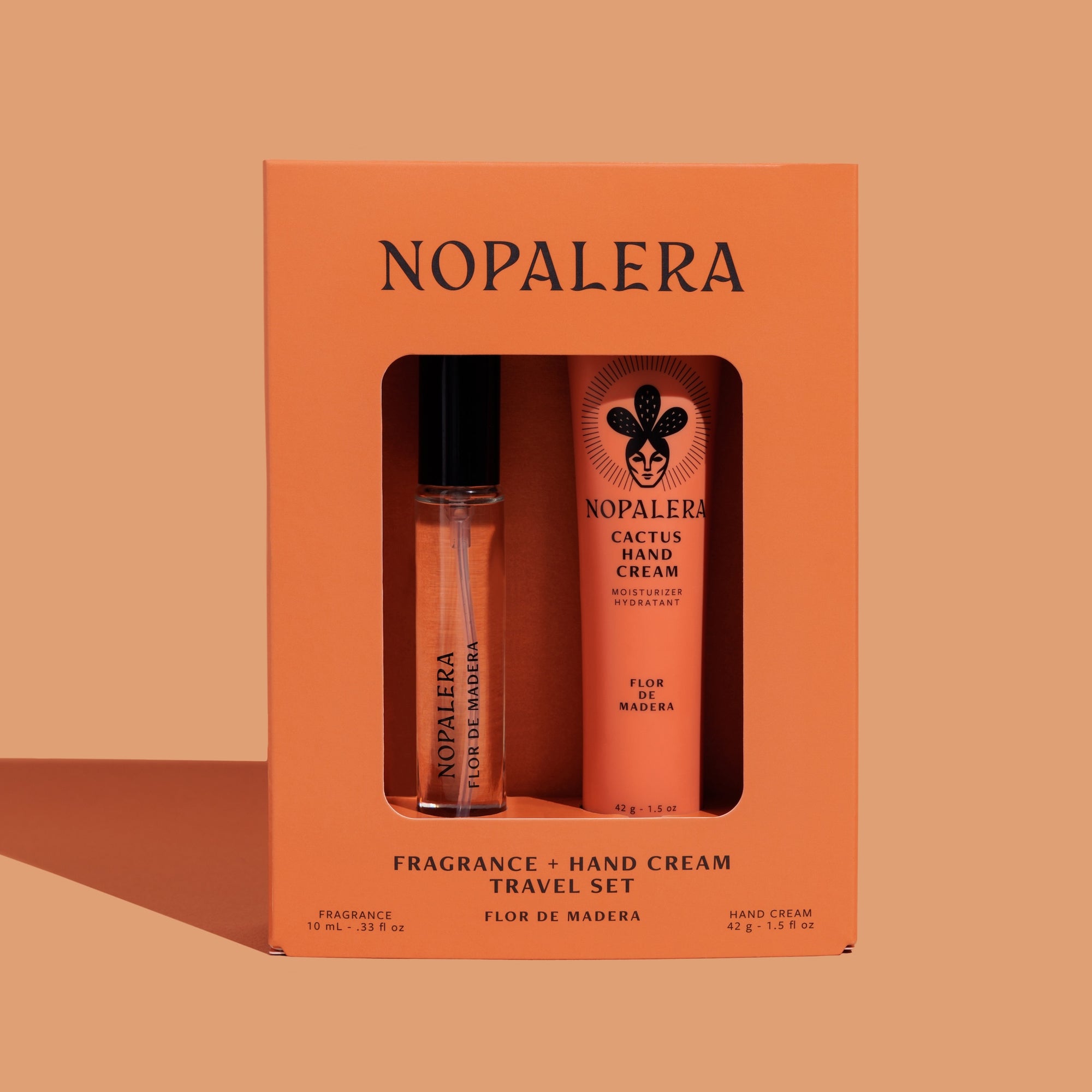 Nopalera Luxury Mexican Flor de Madera fragrance and hand cream travel set in an orange box on a beige background