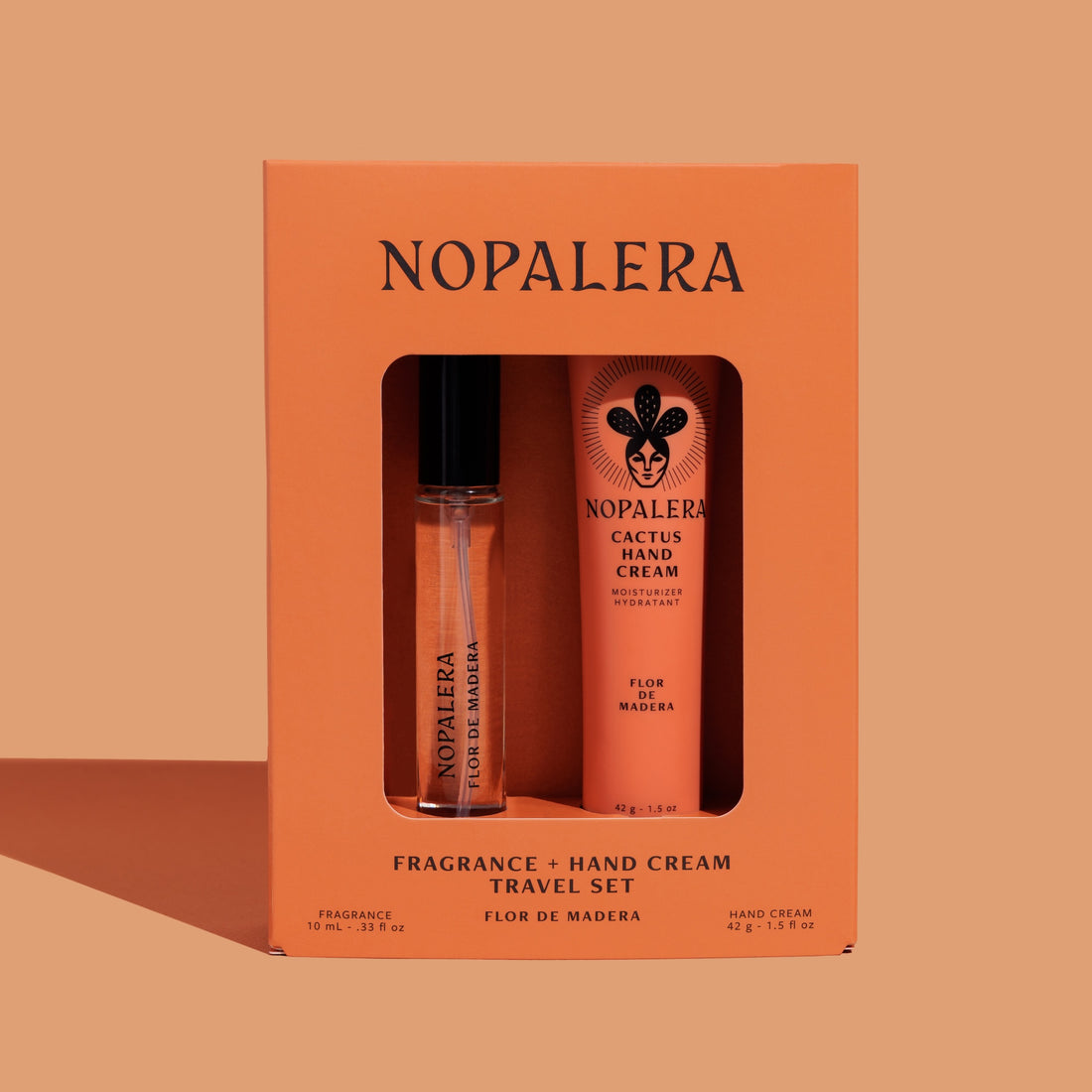 Nopalera Luxury Mexican Flor de Madera fragrance and hand cream travel set in an orange box on a beige background