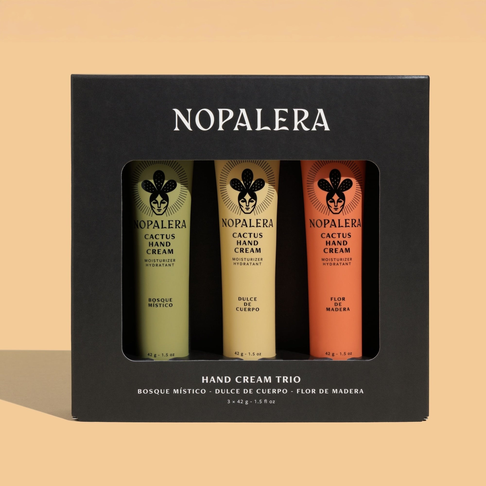 Nopalera hand cream trio packaging on a beige background