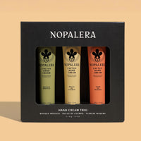 Nopalera hand cream trio packaging on a beige background