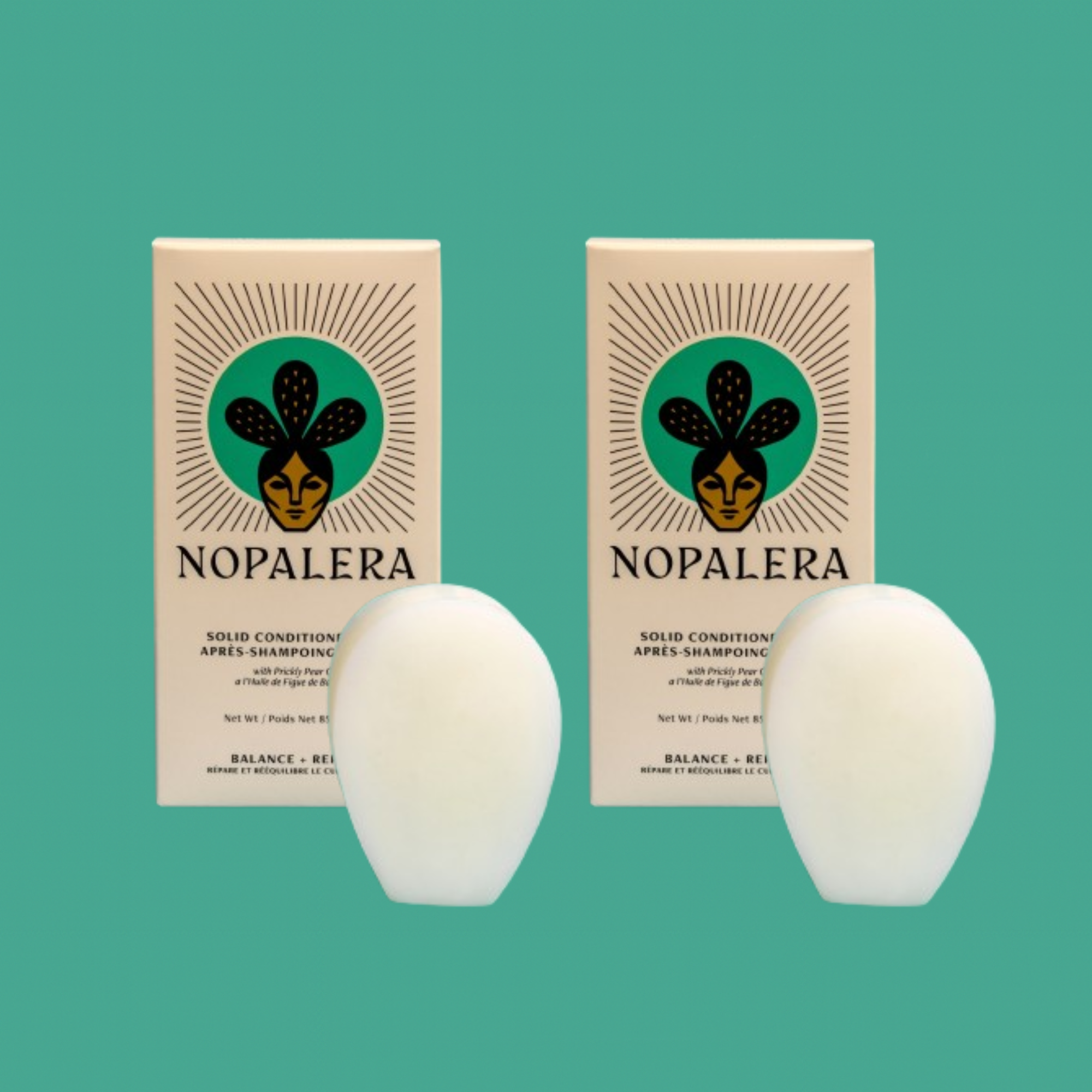 Two Nopalera solid conditioner bars with matching packaging against a green background.