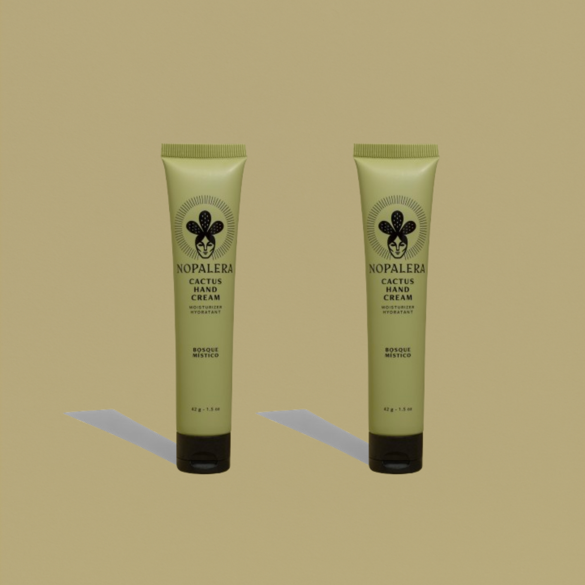 Two tubes of Nopalera Bosque Místico Hand Cream on a green background